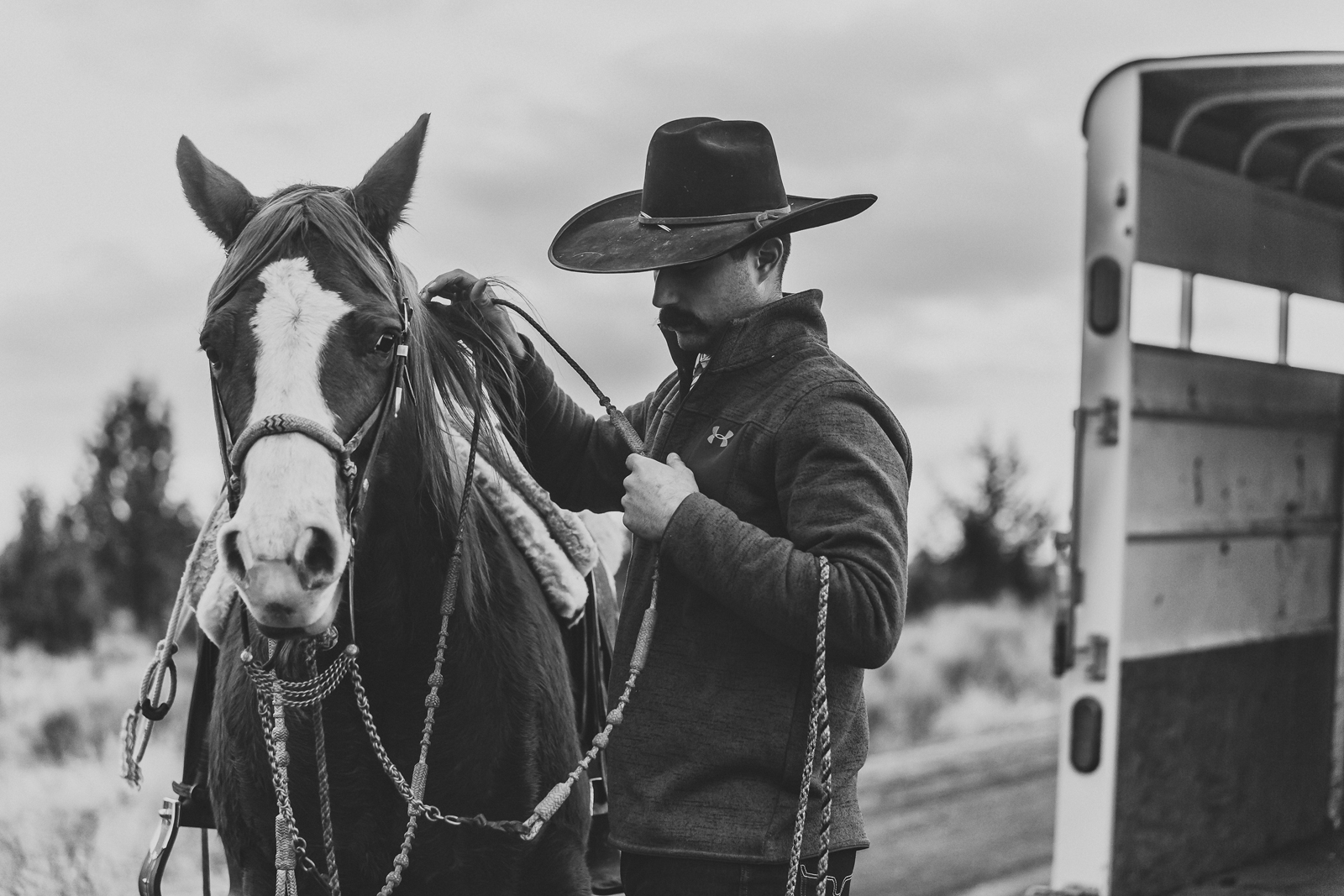 Laze L Farm Photography | CDPhotog Photography Workshop | Burns OR | cowboy saddling his horse