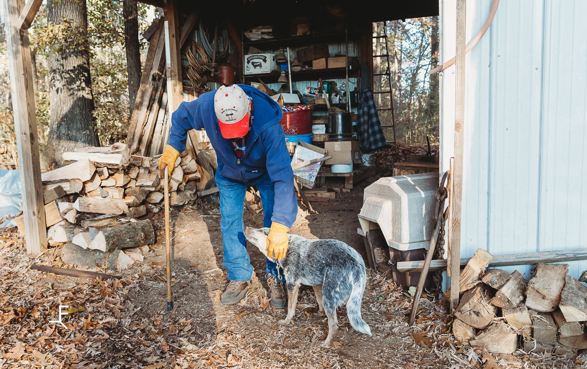 Laze L Farm Photography | Farm Session | Reid Tomlin | Statesville NC | farmer putting his dog