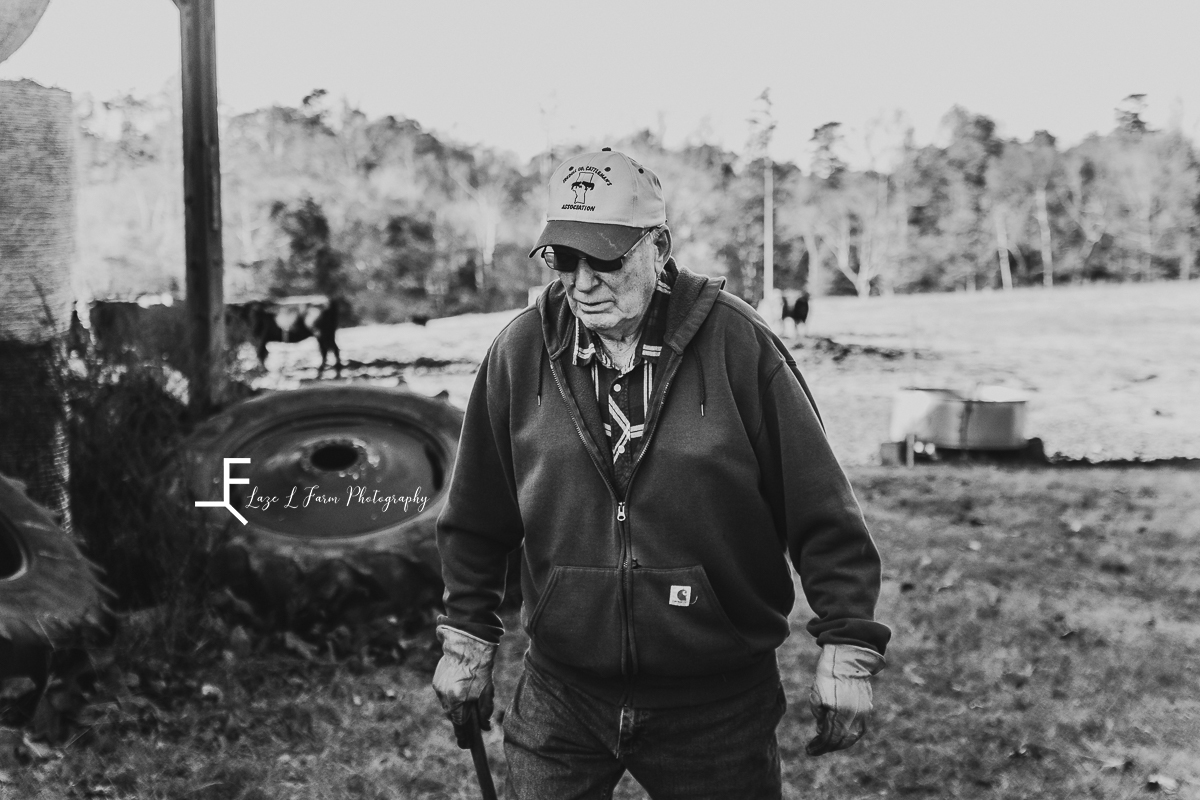 Laze L Farm Photography | Farm Session | Reid Tomlin | Statesville NC | farmer checking his cows