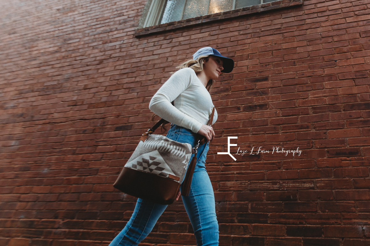 Laze L Farm Photography | Mercy Grey Designs | Ashlyn | Statesville NC | a girl with her mercy grey bag and yeti hat