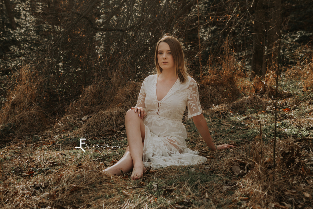 Laze L Farm Photography | Senior 2020 | Taylorsville NC | a girl in a white dress in the woods