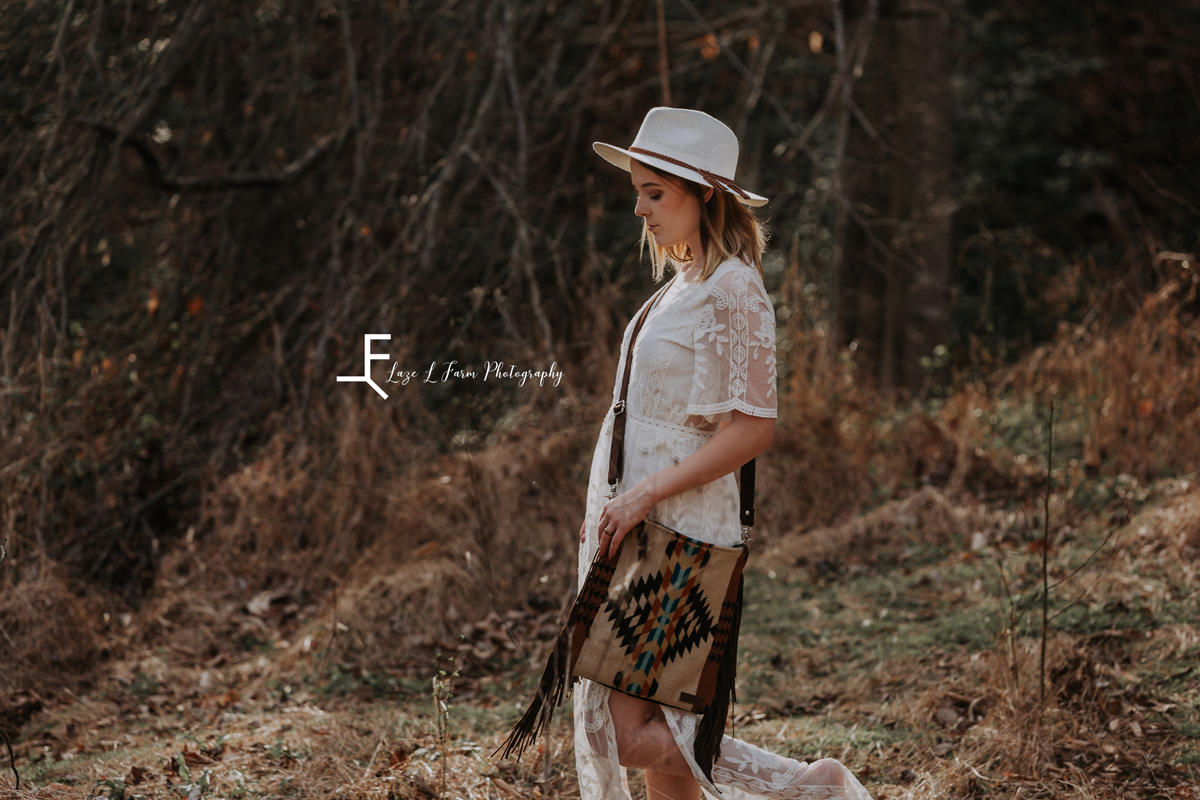 Laze L Farm Photography | Senior 2020 | Taylorsville NC | a girl with a mercy grey bag