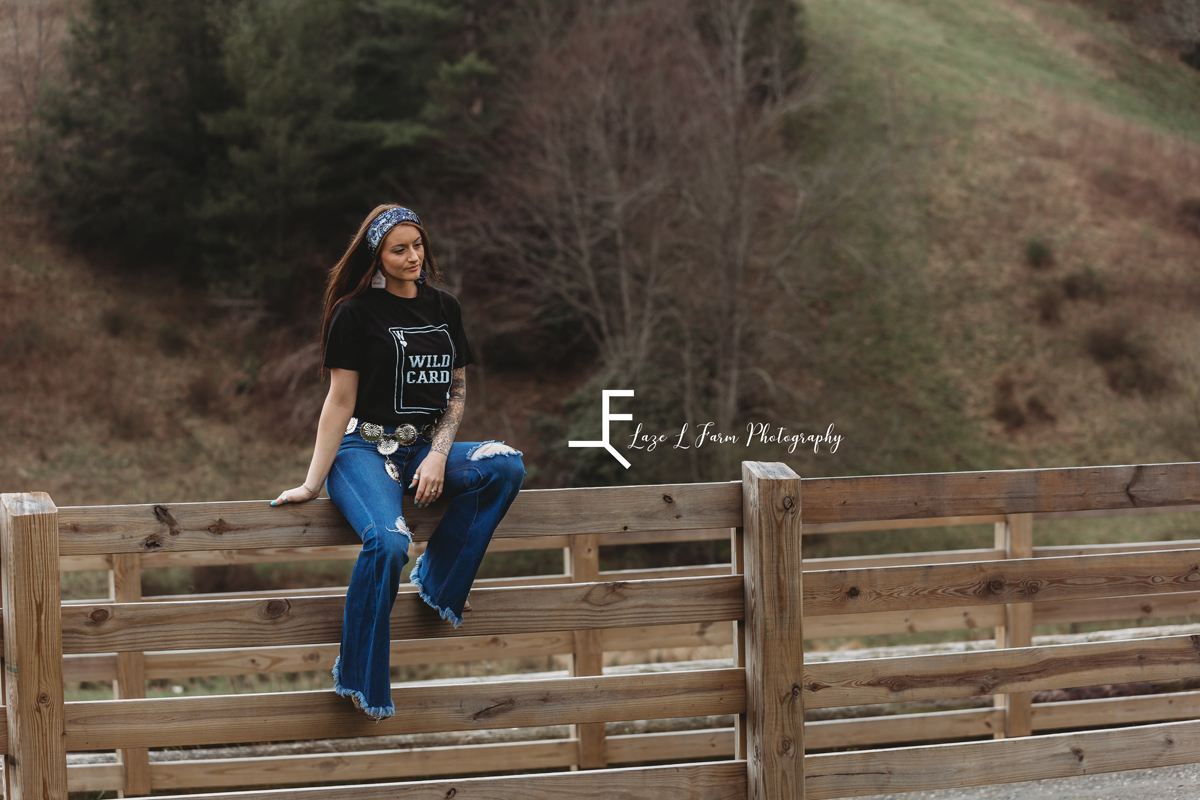 Laze L Farm Photography | NC Equine Photographer | West Jefferson | cowgirl sitting on a wooden fence