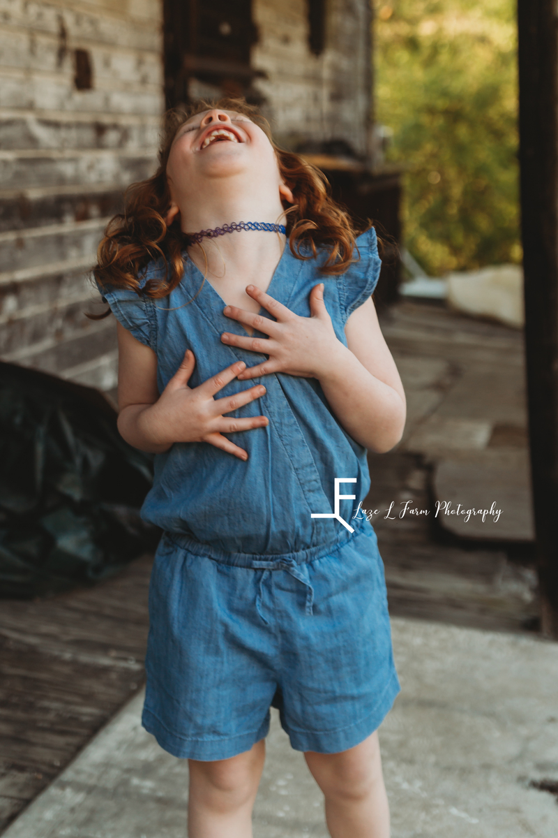 Laze L Farm Photography | a girl and her pony | Taylorsville NC | little girl belly laughing
