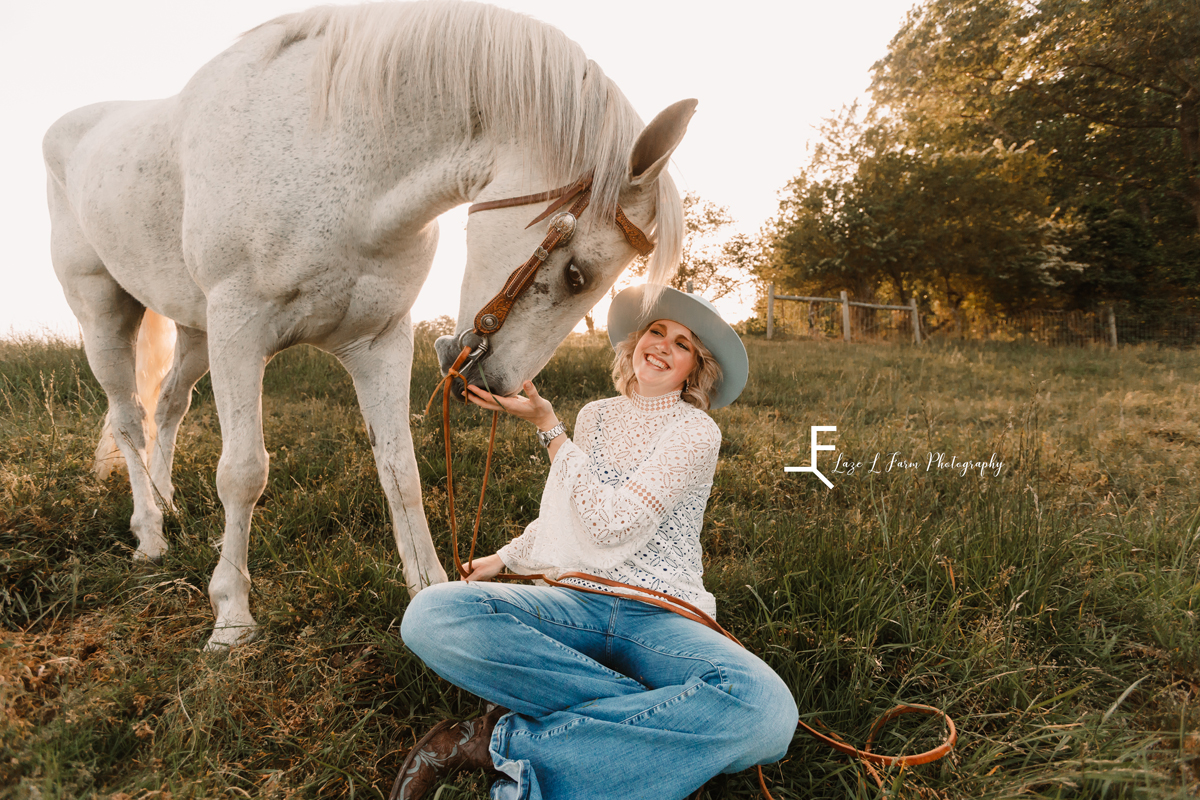 Laze L Farm Photography | Equine Photo Shoot | Taylorsville NC | cowgirl sitting in a field with her horse