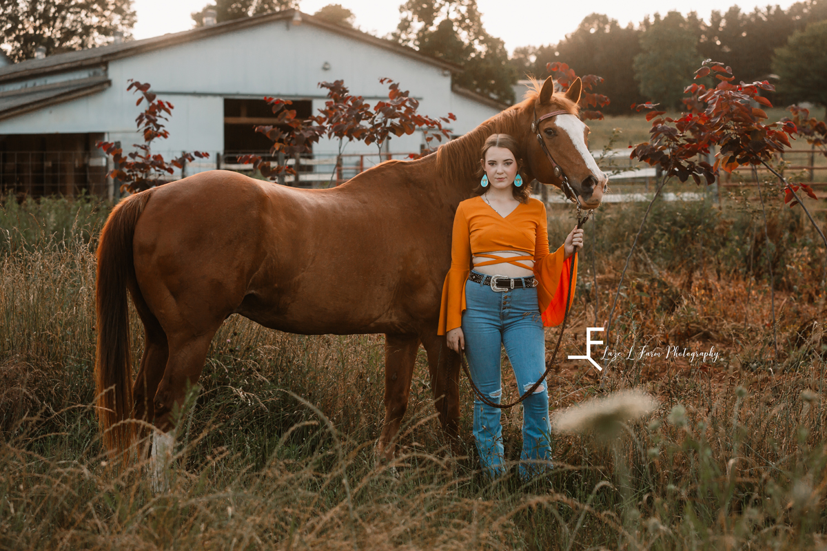 Laze L Farm Photography | Senior 2020 | Equine Photo shoot | Lenoir NC | Deanna standing in front of her horse