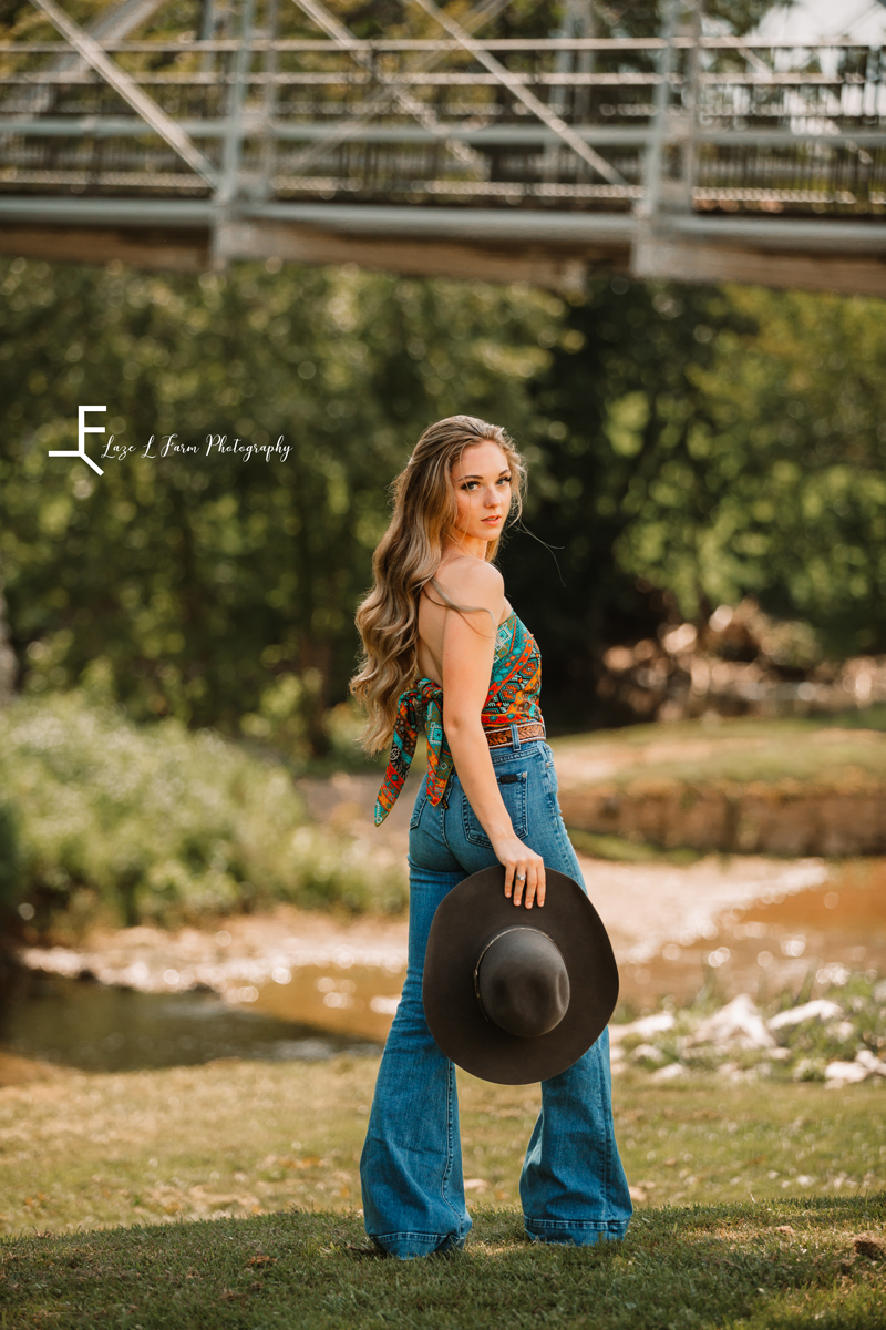Laze L Farm Photography | Western Fashion | Rural Retreat, VA | Ashlyn posing with her hat