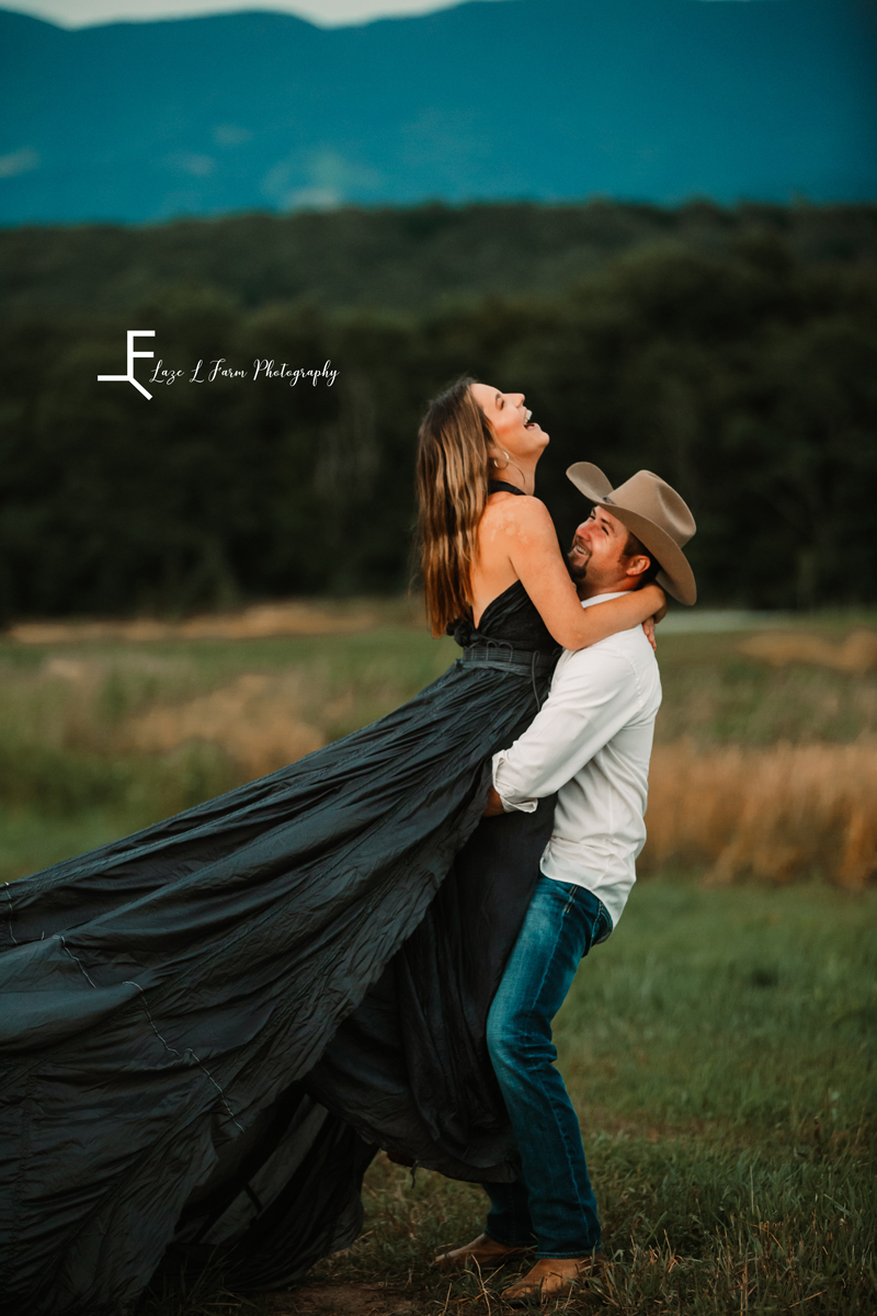 Laze L Farm Photography | The White Crow | Wedding Venue | Banner Elk NC | Him holding her in parachute dress