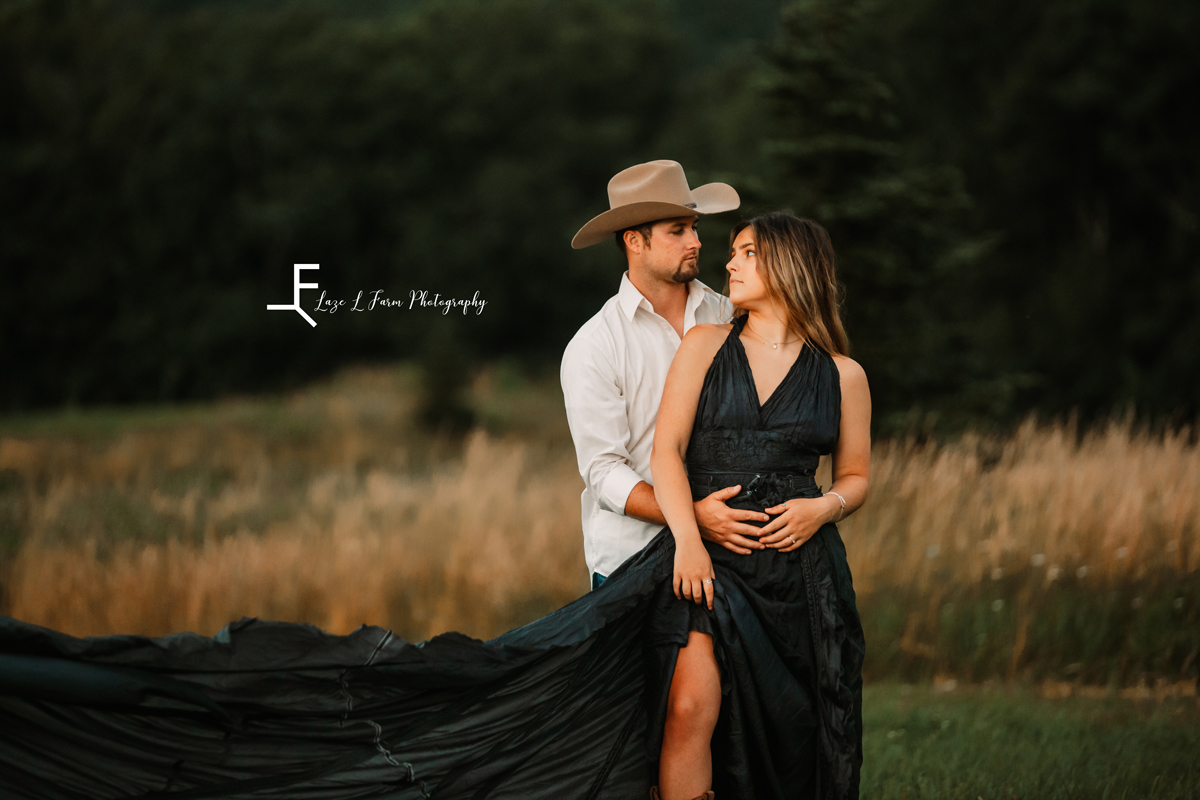 Laze L Farm Photography | The White Crow | Wedding Venue | Banner Elk NC | Couple pose in parachute dress 