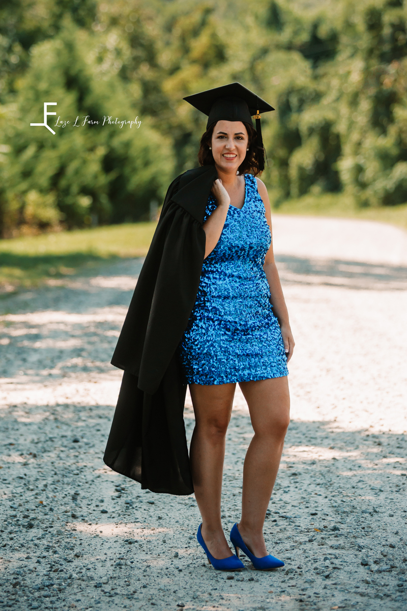 Laze L Farm Photography | Graduation Photography | Taylorsville NC | Holding the gown