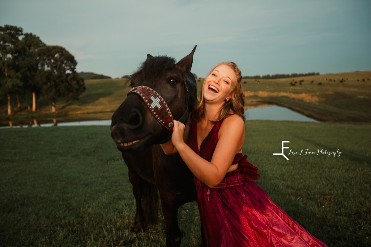 Laze L Farm Photography | Parachute Dress | The Emerald Hill | Kayla laughing with the horse