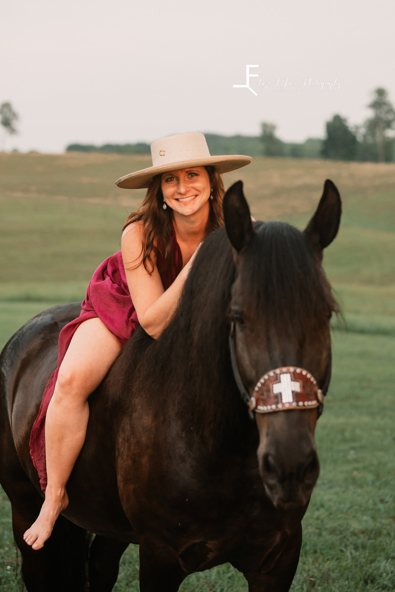 Laze L Farm Photography | Parachute Dress | The Emerald Hill | Stephanie leaning over the horse