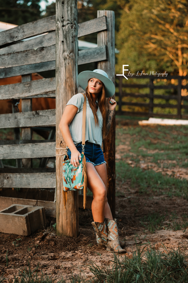 Laze L Farm Photography | Western Lifestyle | Mercy Grey | Taylorsville NC | cowgirl leaning on cattle shoot