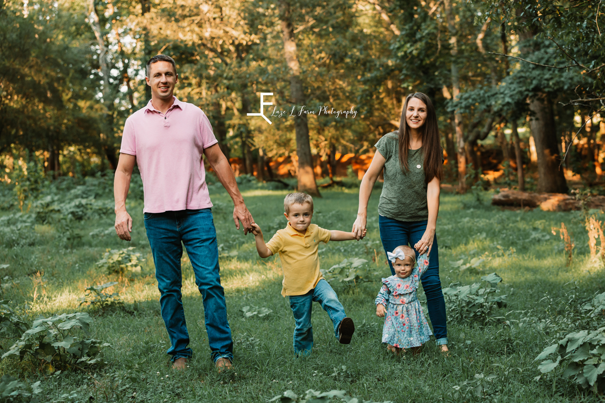 Laze L Farm Photography | Farm Session | Taylorsville NC | family walking in the field