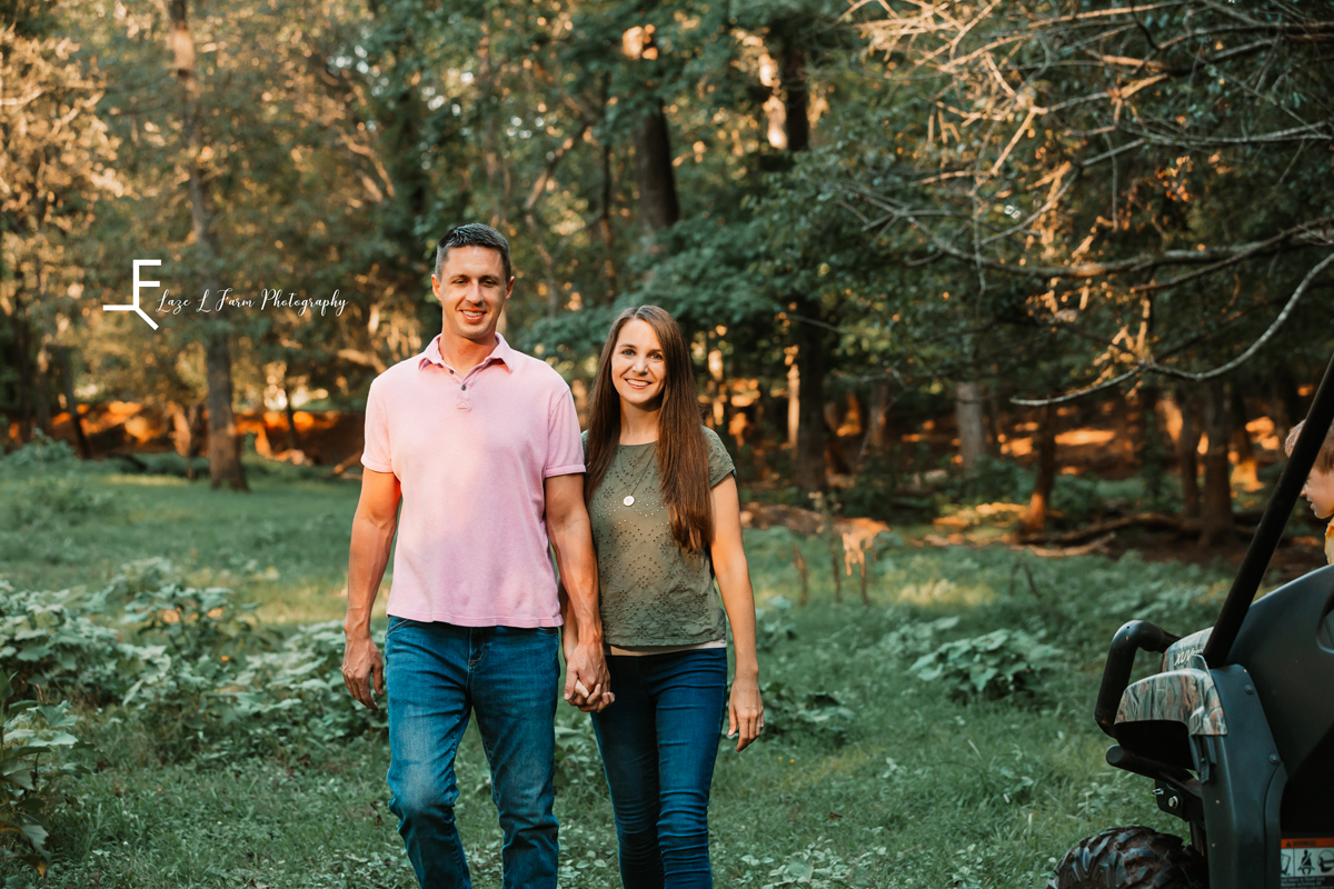 Laze L Farm Photography | Farm Session | Taylorsville NC | husband and wife holding hands