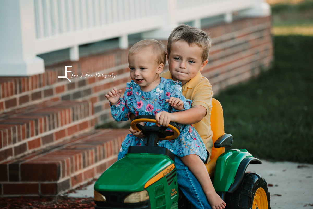 Laze L Farm Photography | Farm Session | Taylorsville NC | brother and sister riding the tractor