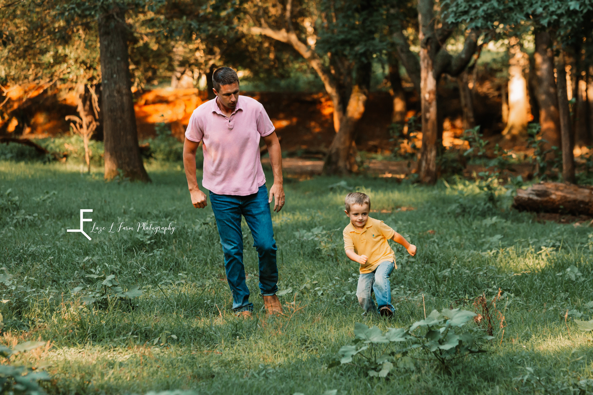 Laze L Farm Photography | Farm Session | Taylorsville NC | father and son walking in a field