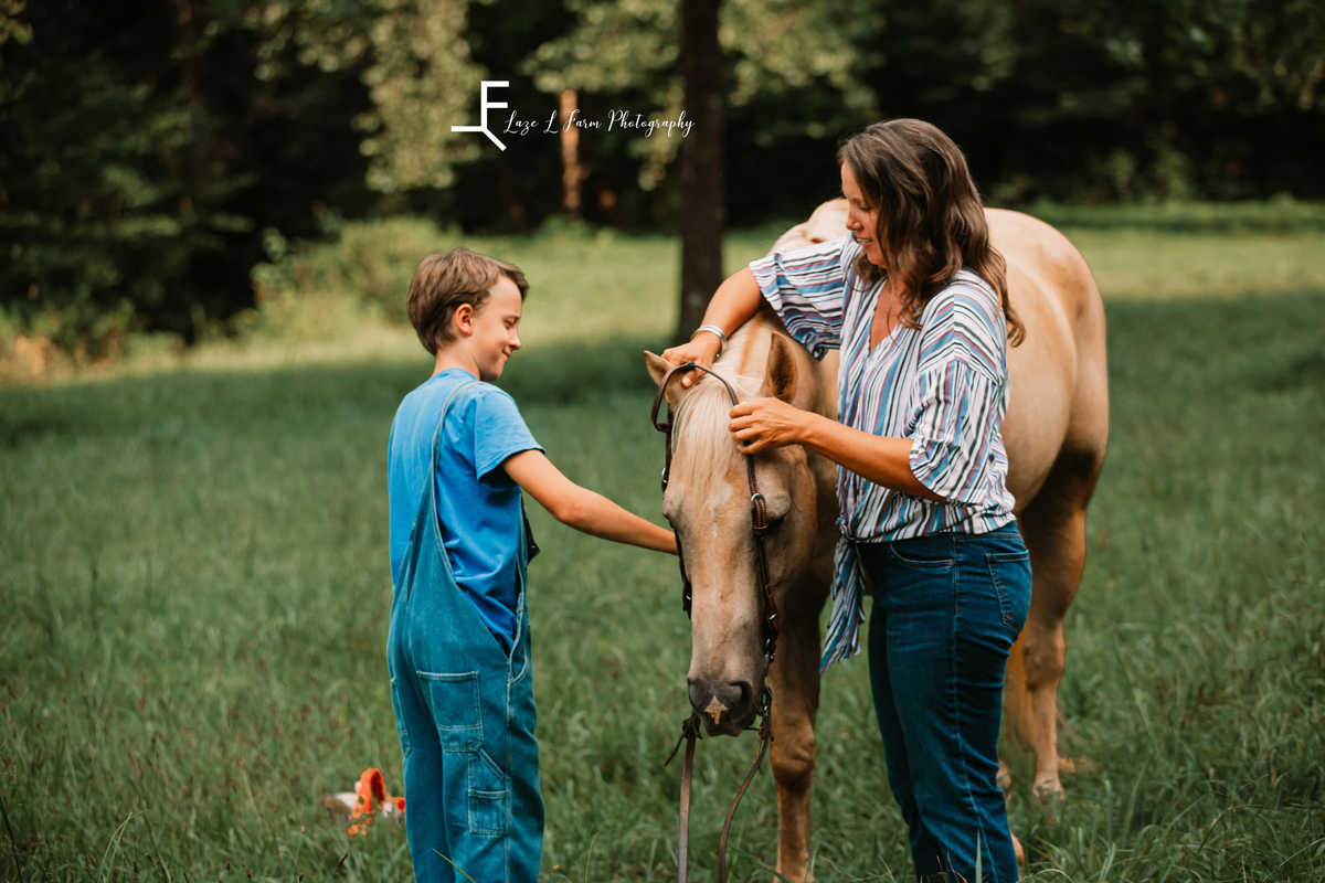 Laze L Farm Photography | Equine Photography | Lenoir NC | minda and kid putting bridle on