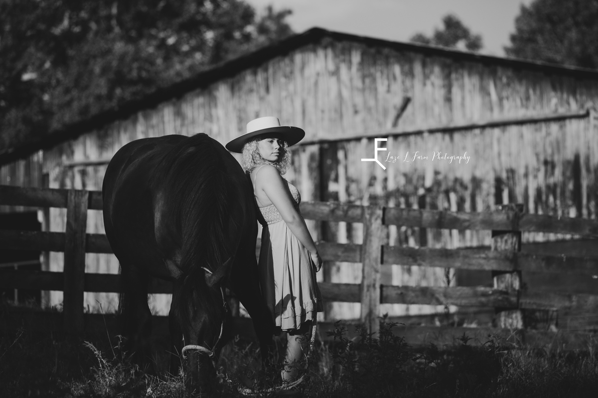 Laze L Farm Photography | Western Lifestyle | Taylorsville NC | Reid standing with horse black and white