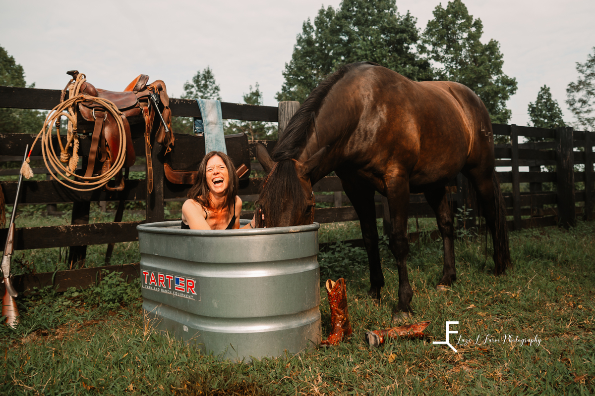 Laze L Farm Photography | Western Lifestyle | Beth Dutton | Taylorsville NC | Laura laughing with the horse