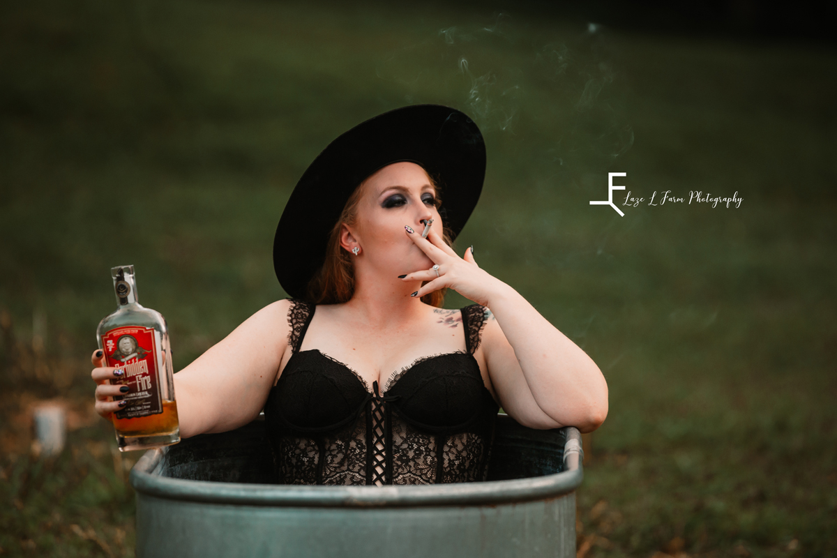 Laze L Farm Photography | Western Lifestyle | Beth Dutton | Taylorsville NC | Devon smoking a cigarette, whisky in hand