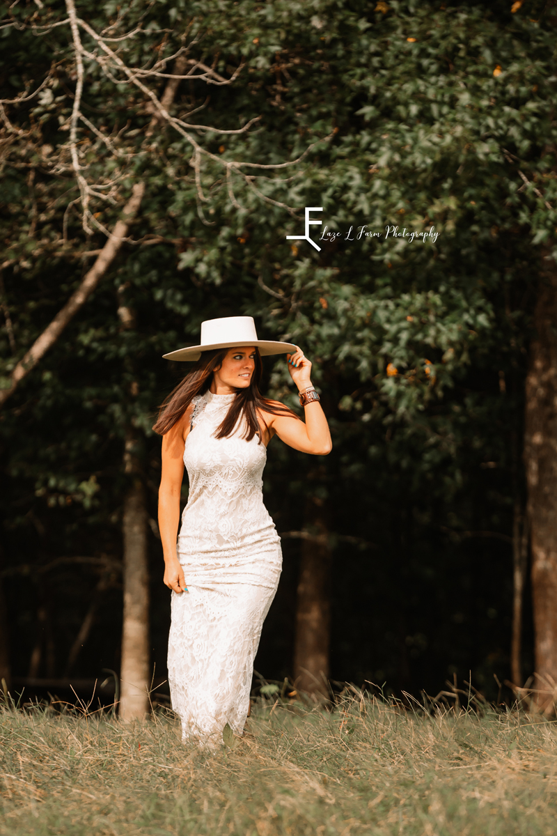  Laze L Farm Photography | Equine Photography | Taylorsville NC | Danielle posing in white dress and hat looking away