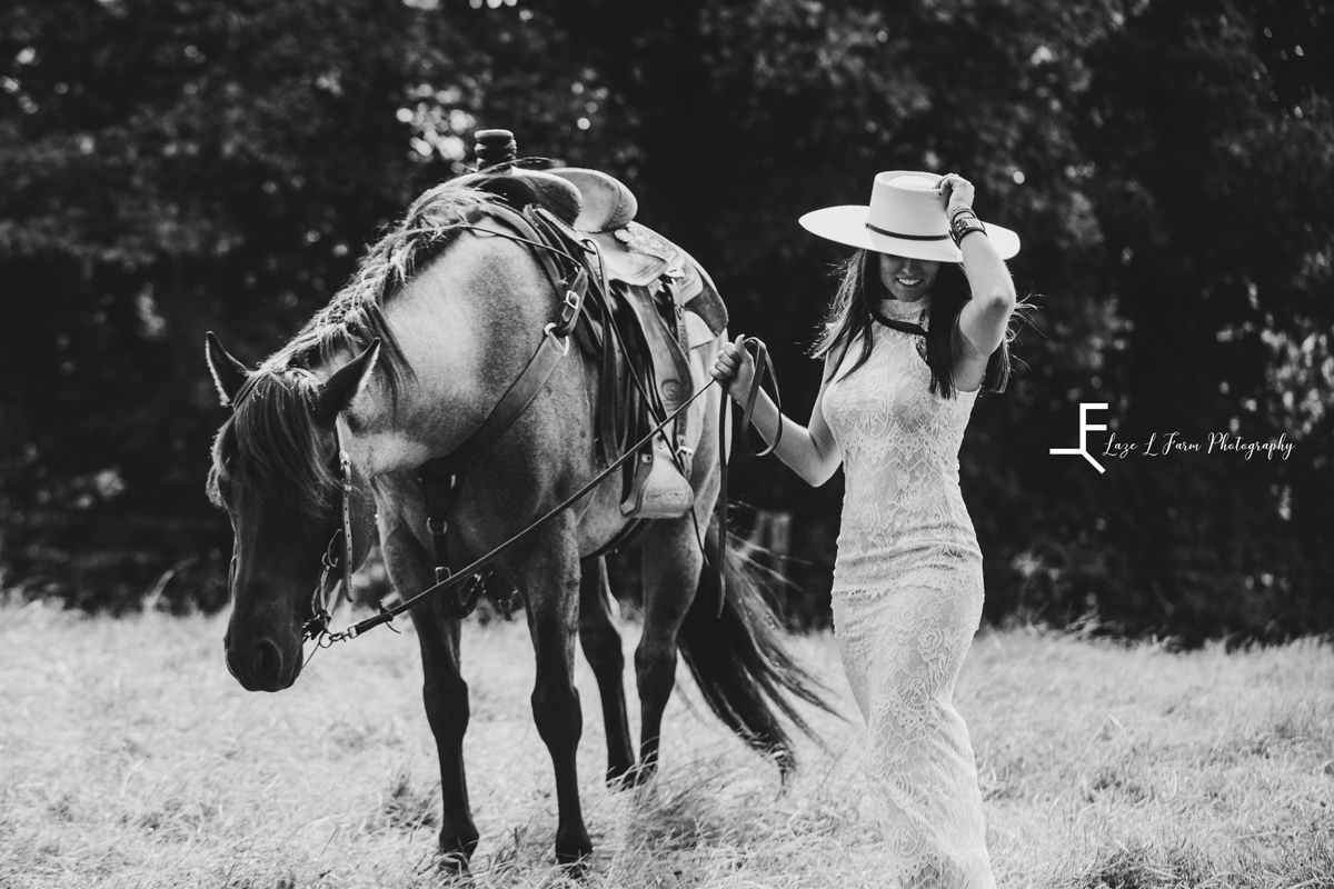  Laze L Farm Photography | Equine Photography | Taylorsville NC | black and white of danielle walking the horse