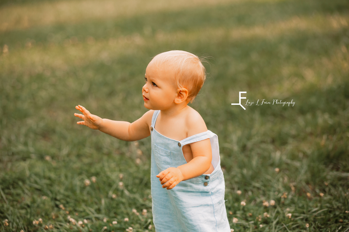 Laze L Farm Photography | Farm Session | Bethlehem NC | Candid of the baby