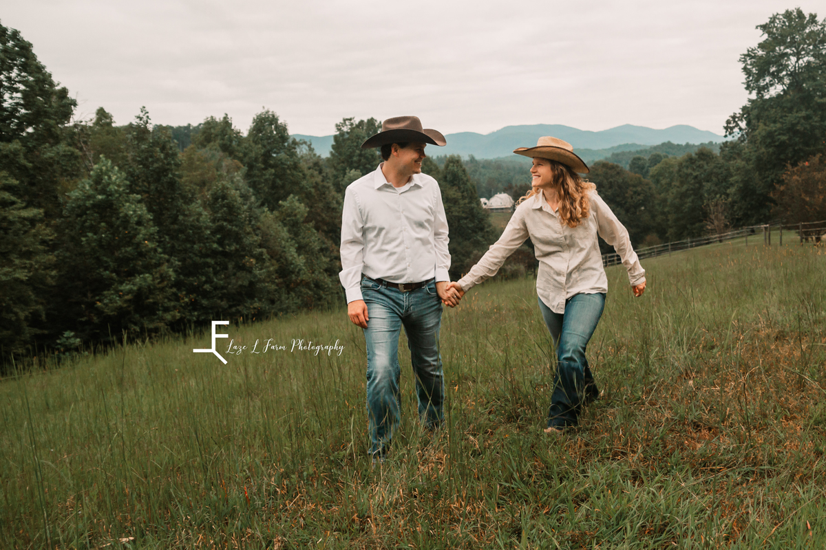 Laze L Farm Photography | Farm Session | Moravian Falls NC | Couple walking together