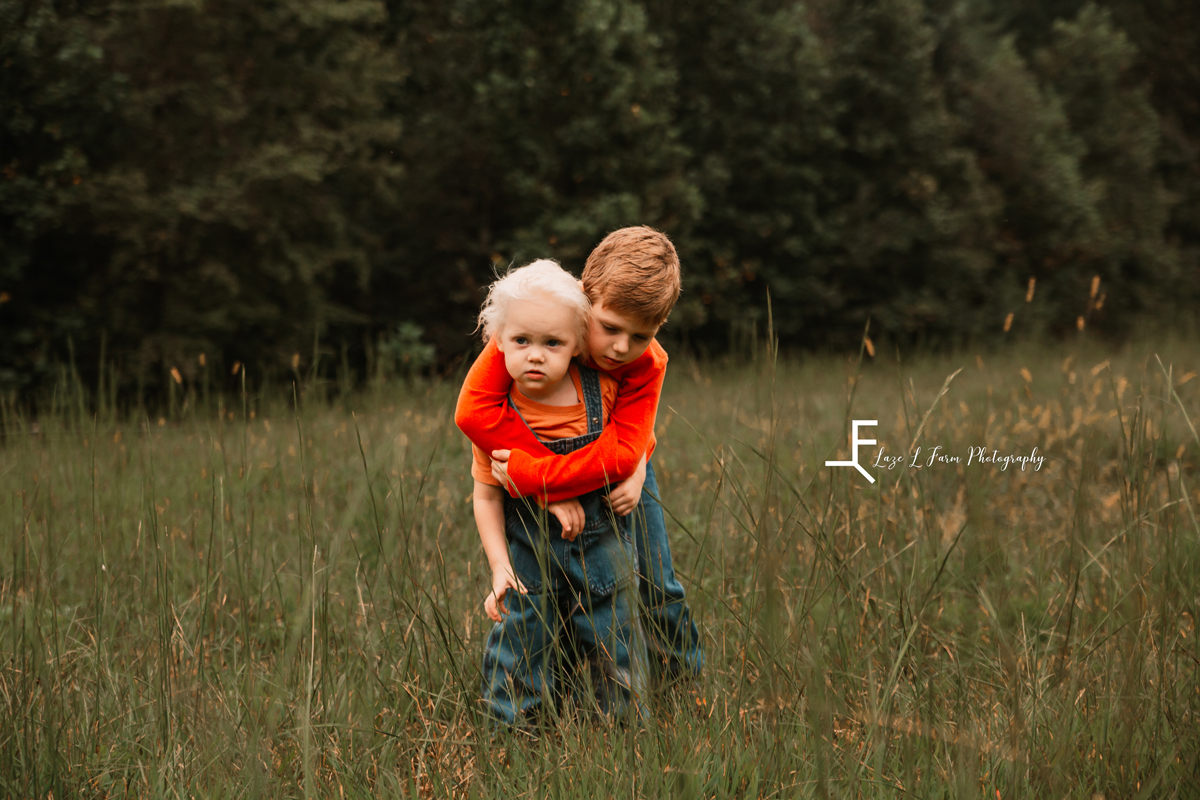 Laze L Farm Photography | Farm Session | Moravian Falls NC | Kiddos hugging