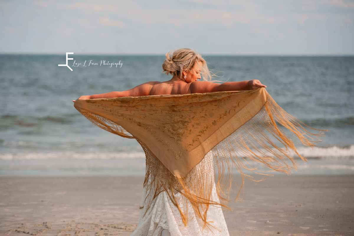 Laze L Farm Photography | Beach Bridals | Tybee Island GA | Kelly twirling on the beach