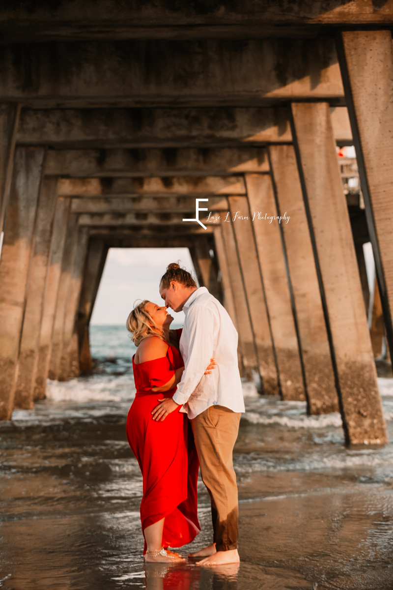Laze L Farm Photography | Beach Session | Tybee Island GA | kissing under the pier