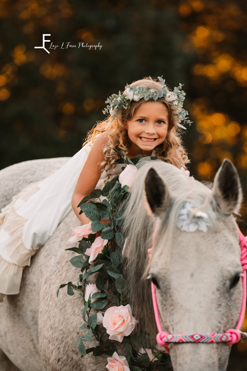 Laze L Farm Photography | Farm Session | Taylorsville NC | little sister smiling on horse