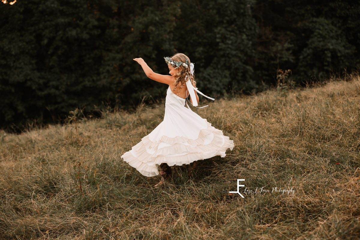 Laze L Farm Photography | Farm Session | Taylorsville NC | little sister twirling in dress