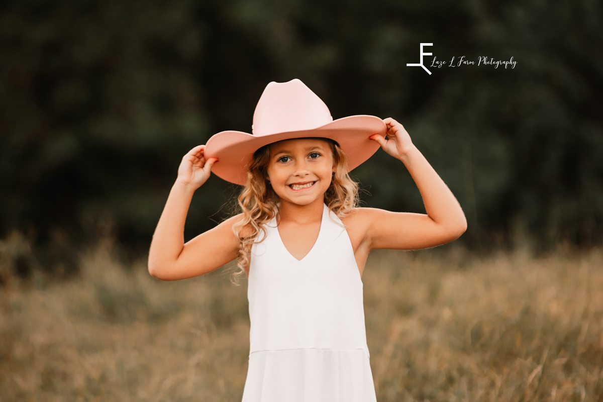 Laze L Farm Photography | Farm Session | Taylorsville NC | posing with the hat