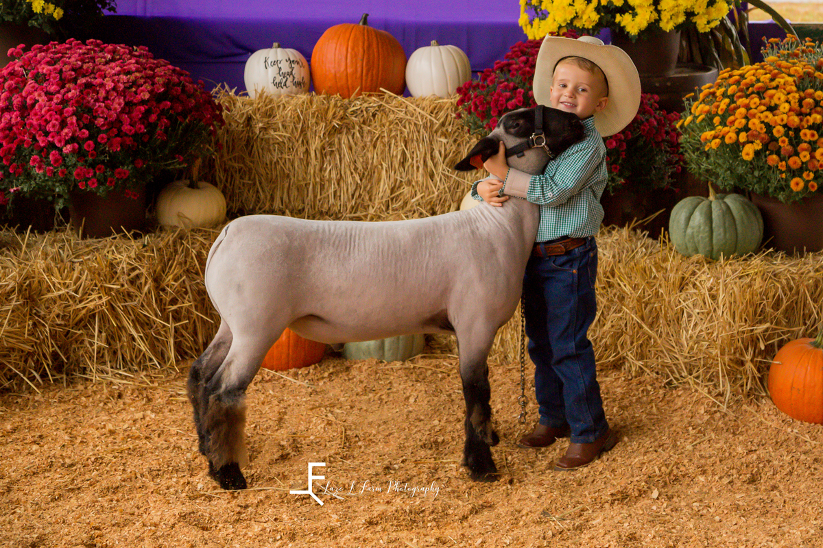 Laze L Farm Photography | Livestock Show | Lenoir NC | little boy posing his sheep