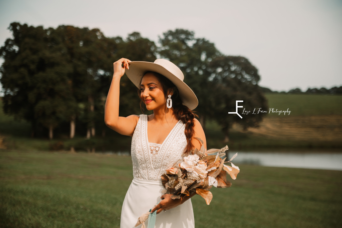 Laze L Farm Photography | Styled Shoot | The Emerald Hill | bride with hat and bouquet
