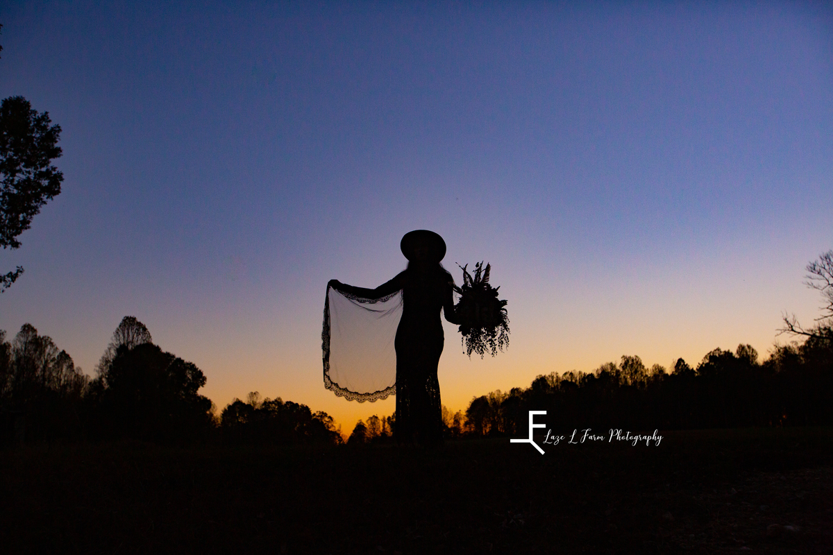 Laze L Farm Photography | Bridal Portraits | Liberty NC | sunset silhouette pose holding the tulle and bouquet