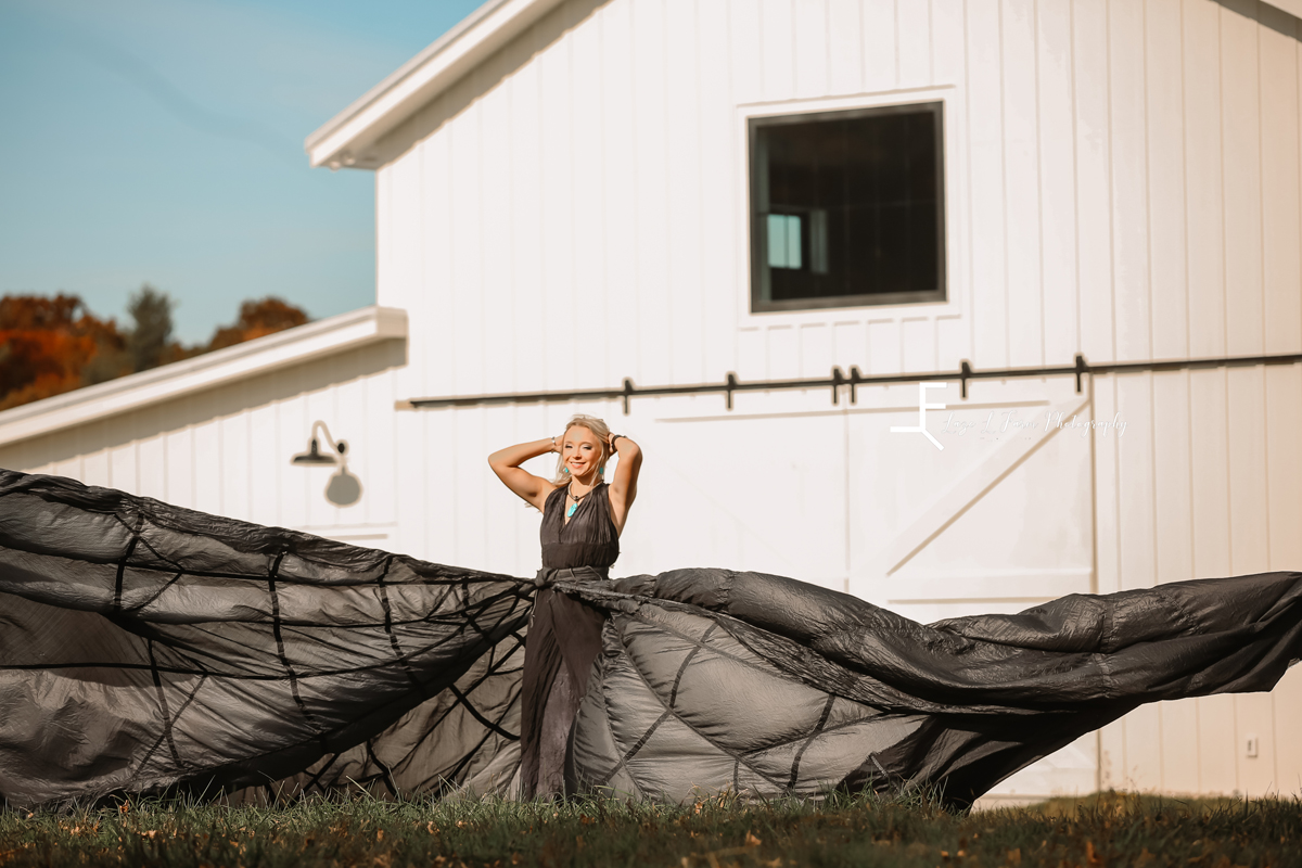 Laze L Farm Photography | Parachute Dress | The White Crow | banner elk nc | Reagan, parachute dress against white barn