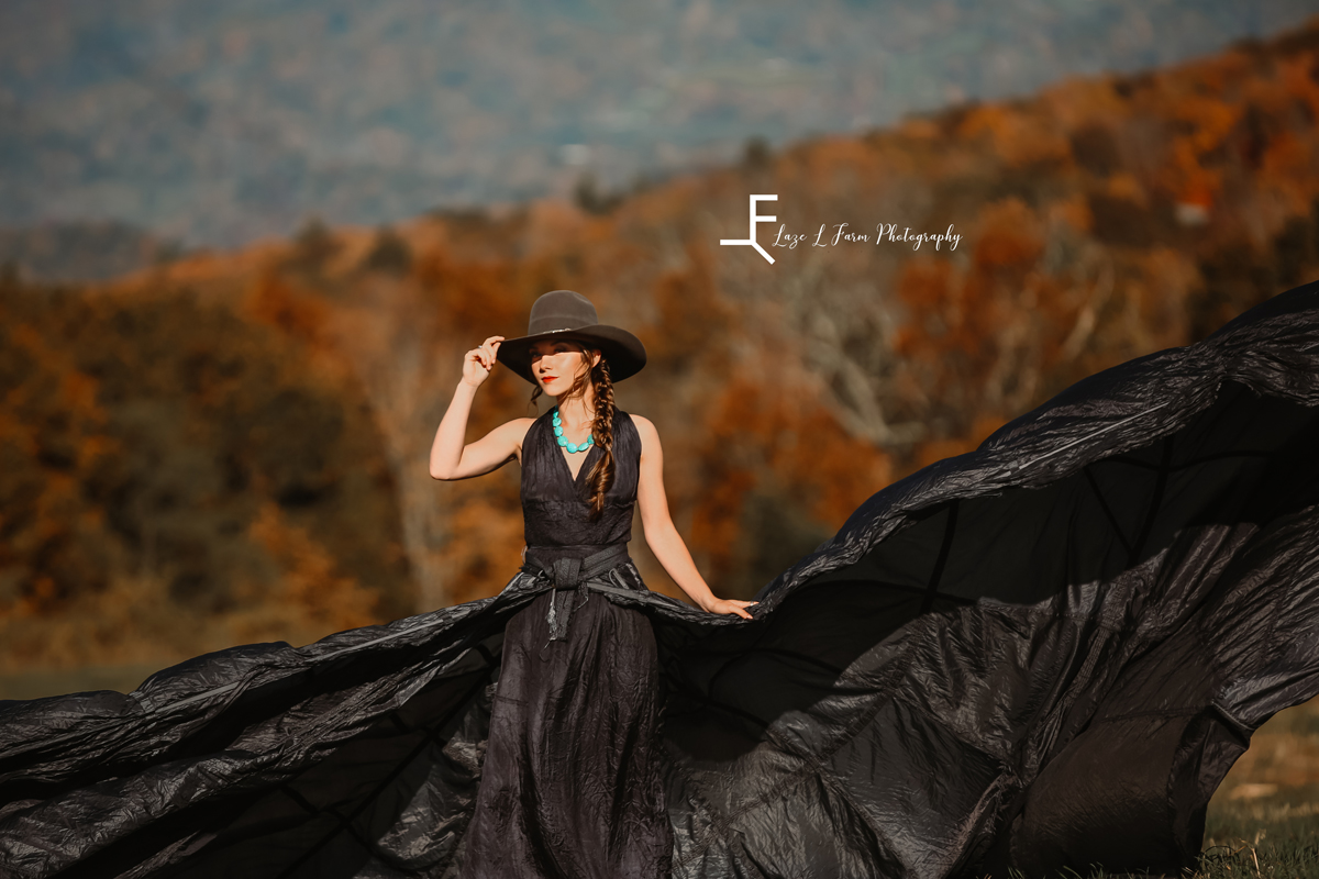 Laze L Farm Photography | Parachute Dress | The White Crow | banner elk nc | Ashlyn posing in parachute dress and hat