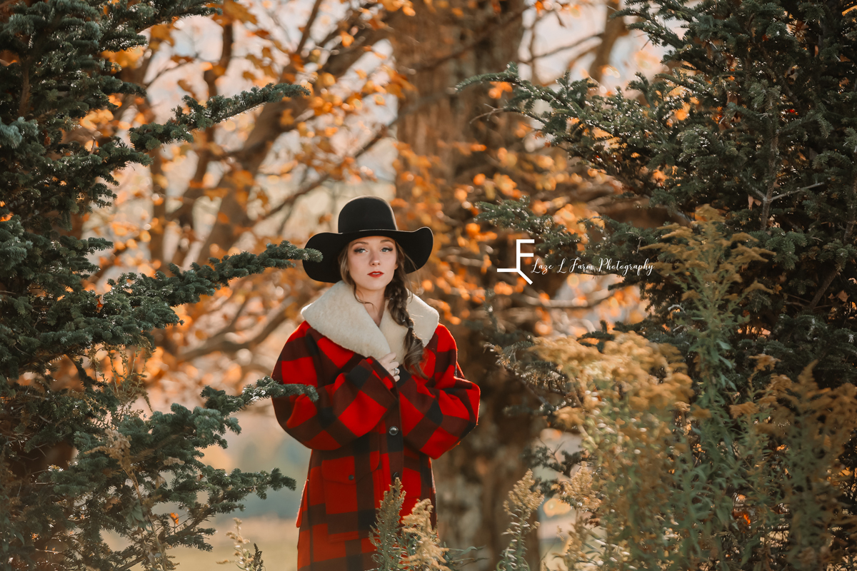 Laze L Farm Photography | Parachute Dress | The White Crow | banner elk nc | Ashlyn posing in the trees with flannel coat