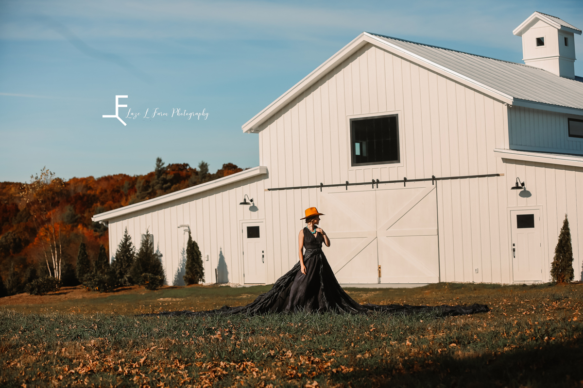 Laze L Farm Photography | Parachute Dress | The White Crow | banner elk nc | Ashlyn in parachute dress standing in front of white barn