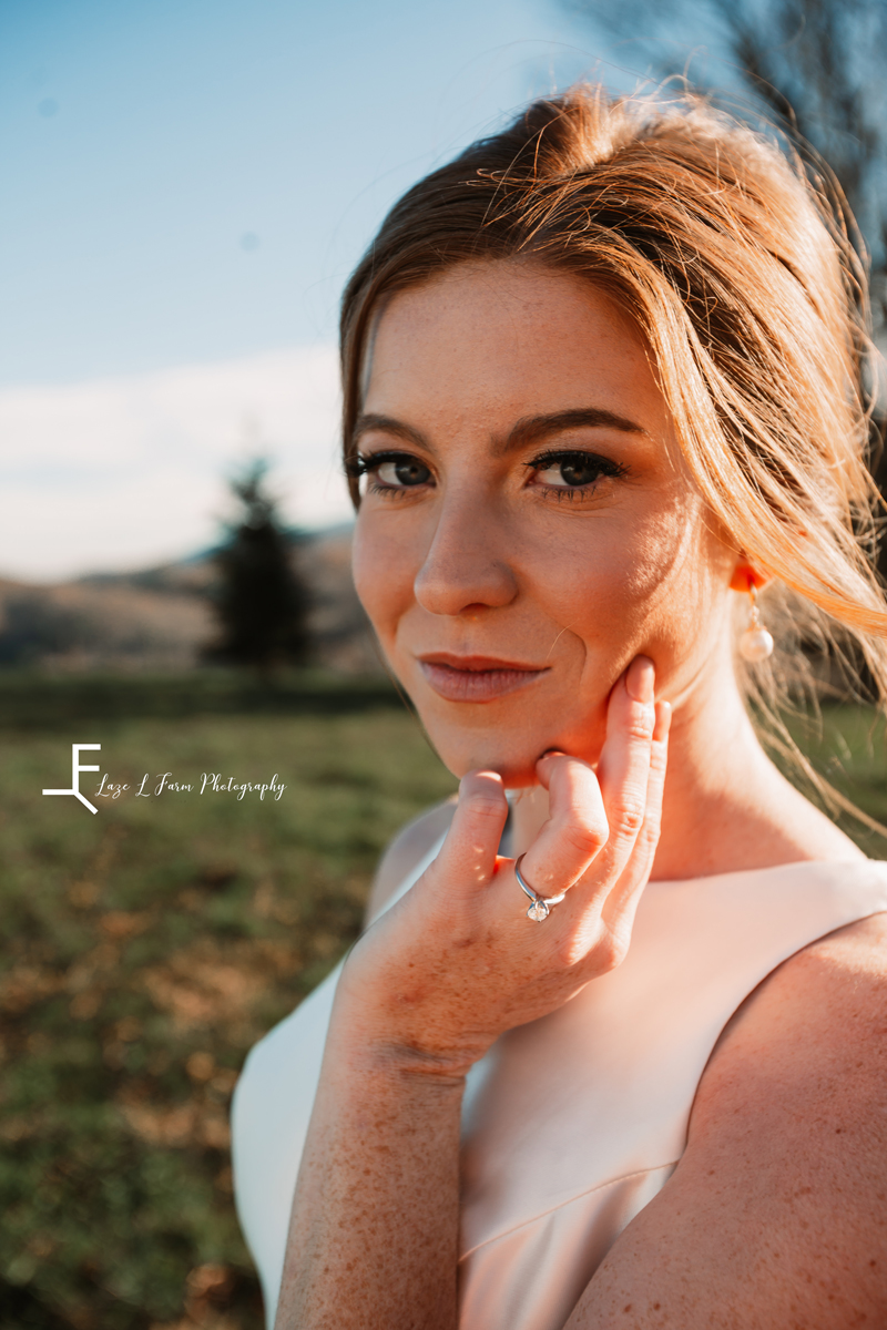 Laze L Farm Photography | Banner Elk NC | The White Crow | close up of the bride's face and ring