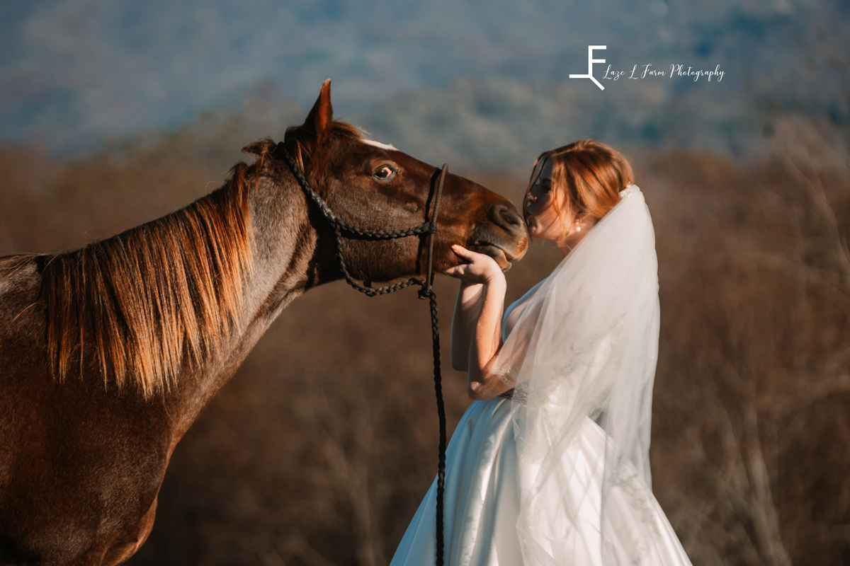 Laze L Farm Photography | Banner Elk NC | The White Crow | Bride kissing the horse