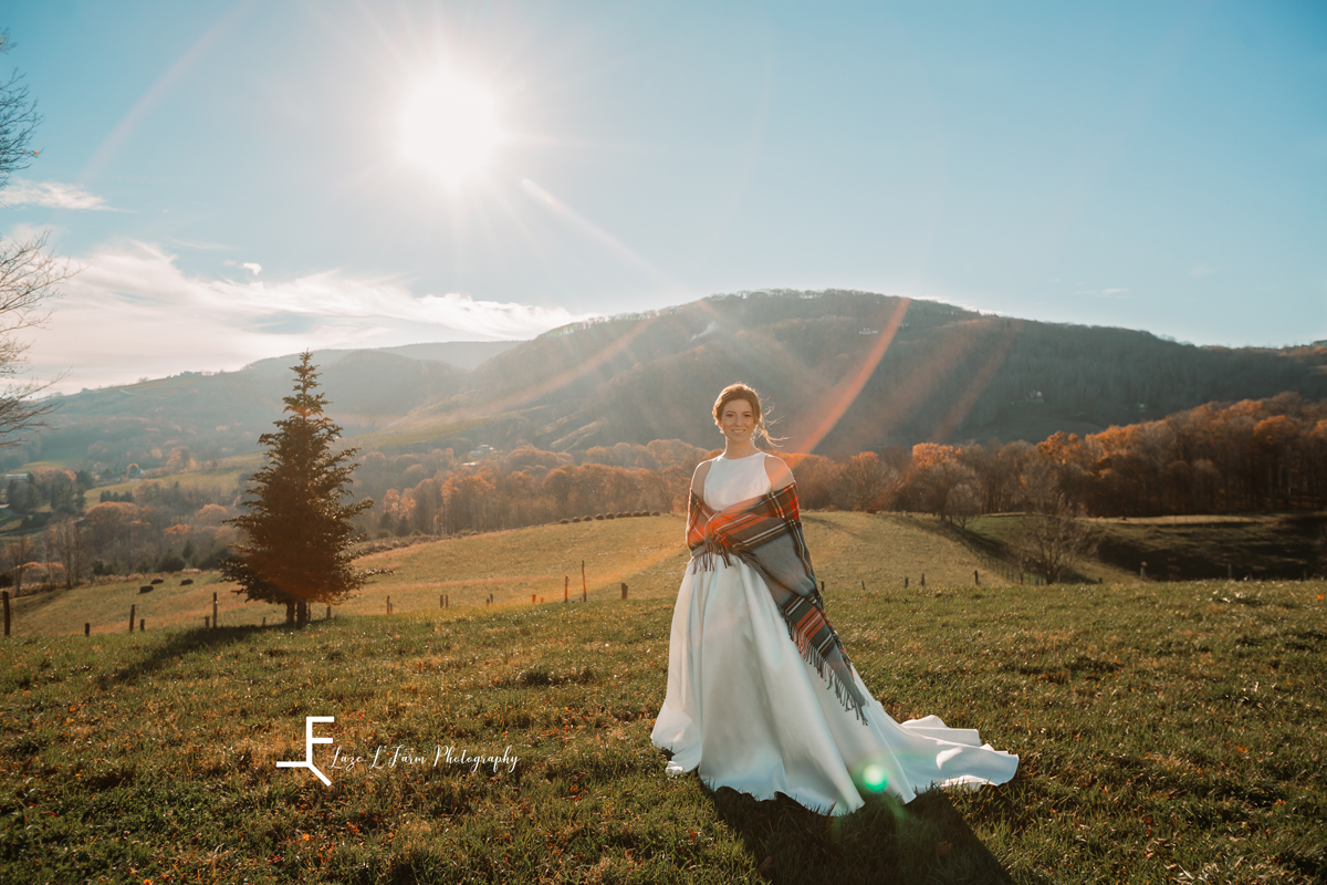 Laze L Farm Photography | Banner Elk NC | The White Crow | Bride posing outside