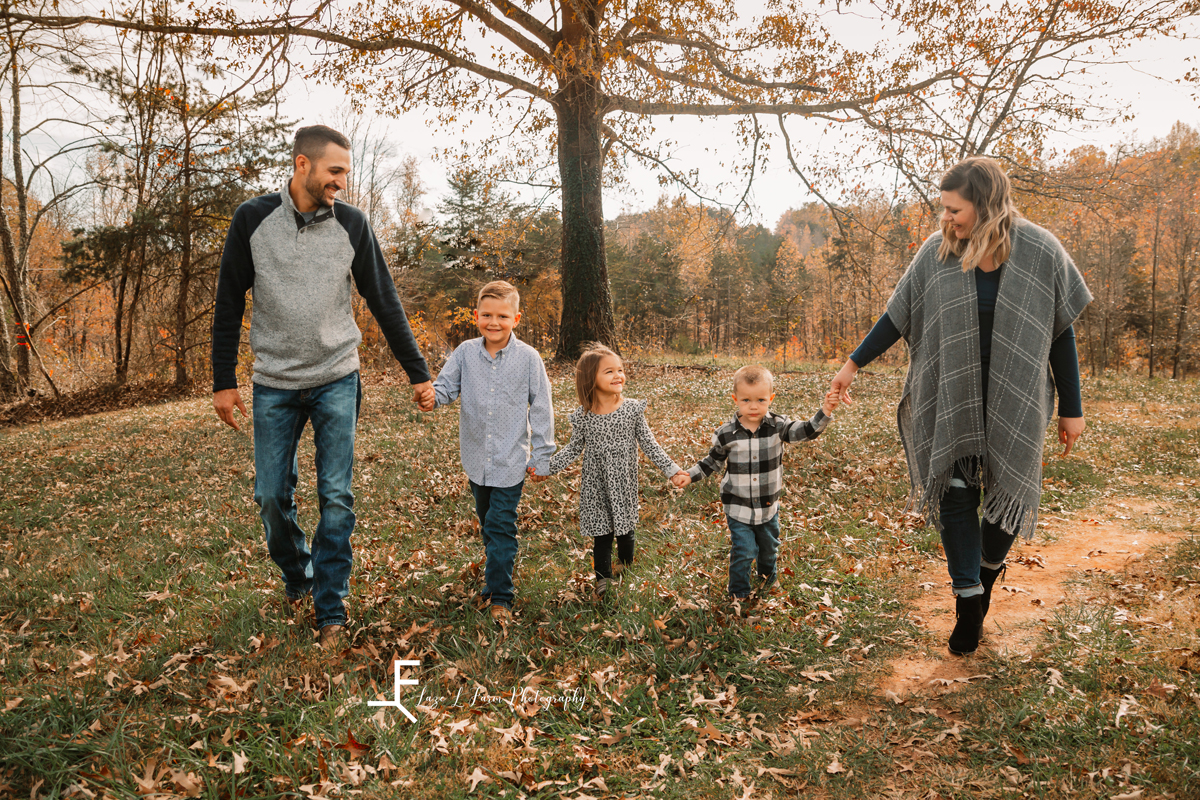 Laze L Farm Photography | Farm Session | Taylorsville NC | candid family walking holding hands