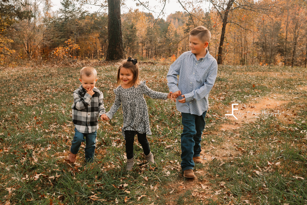 Laze L Farm Photography | Farm Session | Taylorsville NC | three kids candid walking