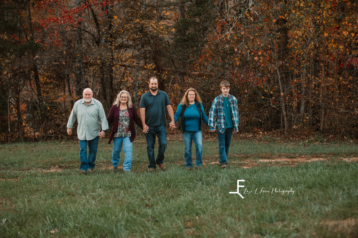 Laze L Farm Photography | Farm Session | Taylorsville NC | family walking towards camera