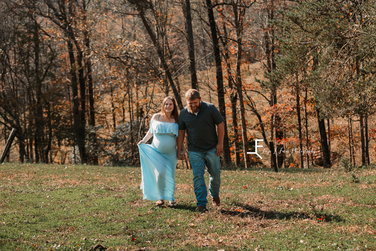Laze L Farm Photography | Farm Session | Taylorsville NC | couple candid walking towards camera