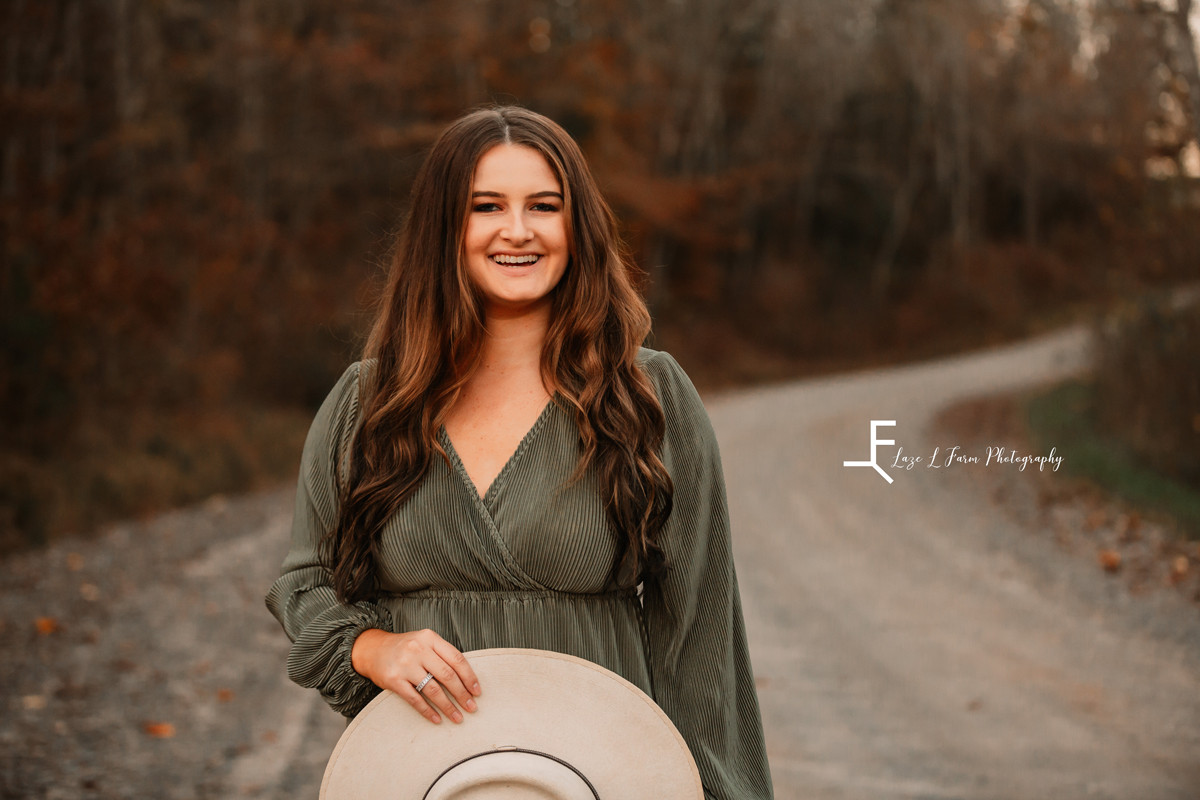 Laze L Farm Photography | Western Lifestyle | Taylorsville NC | smiling and holding her hat